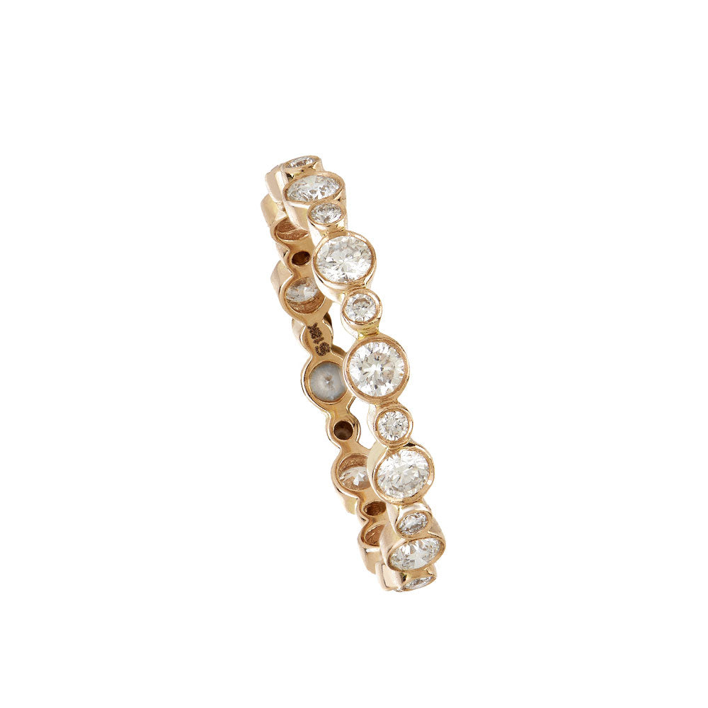 18 Karat Yellow Gold Aurelia ring with Round Bezel set Diamonds