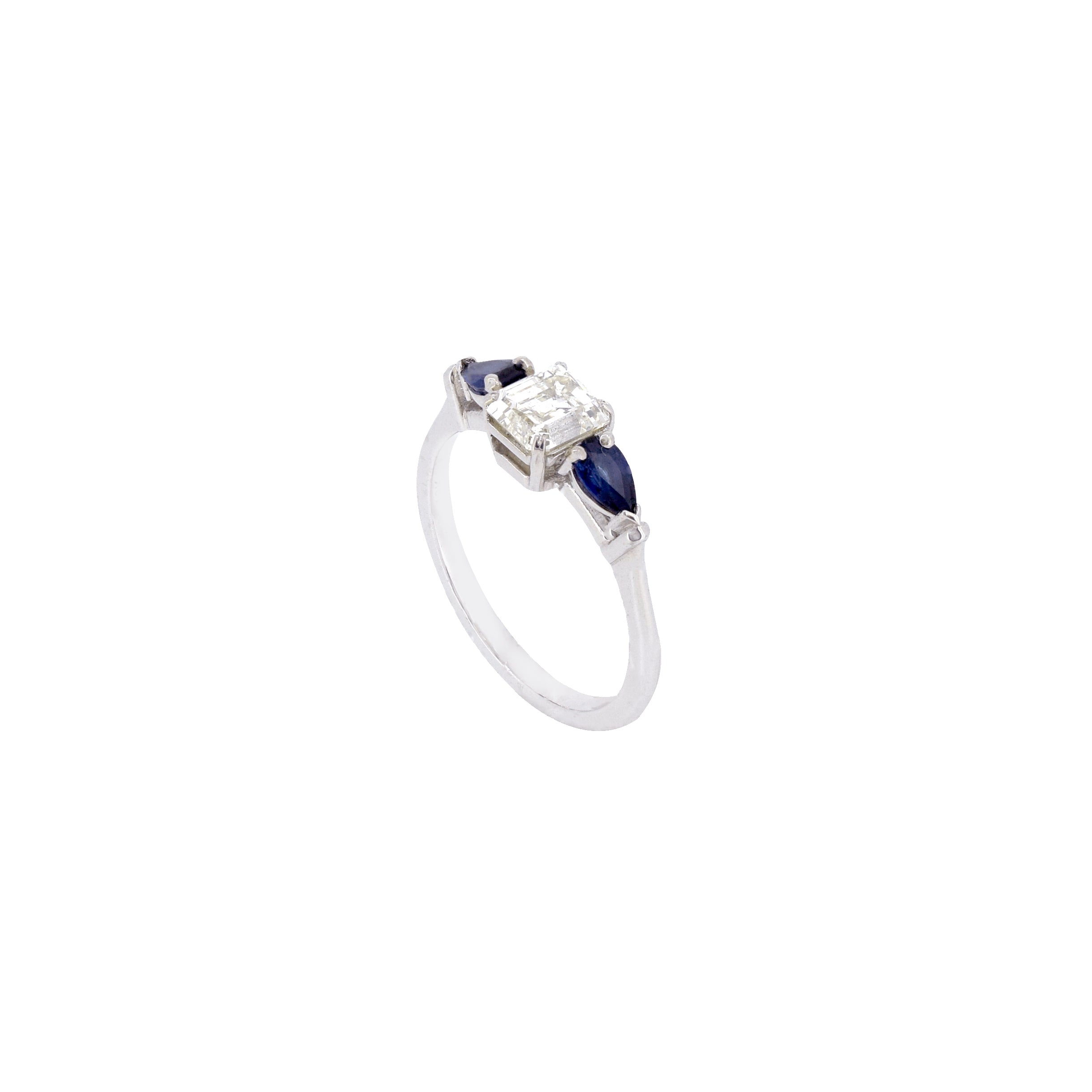 Exquisite 18K white gold ring with three blue sapphires and an Asscher diamond, perfect for a refined and elegant look