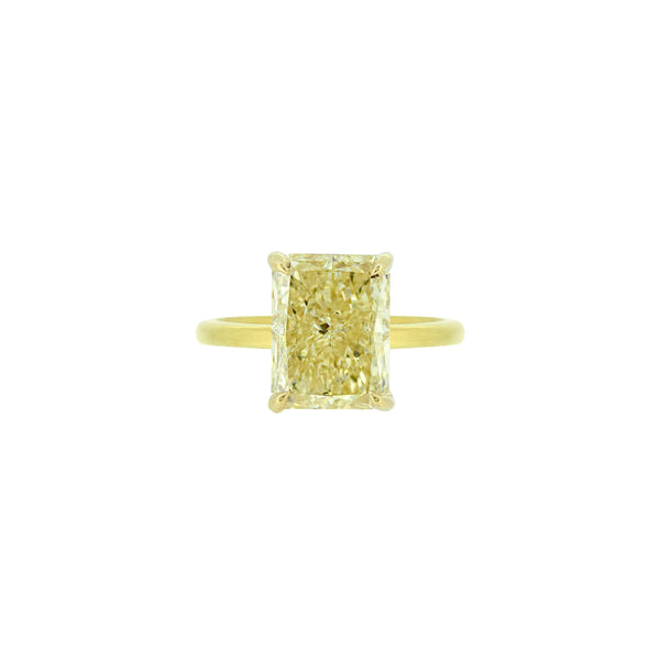 Stunning yellow diamond ring with square cut stone radiating elegance and sophistication