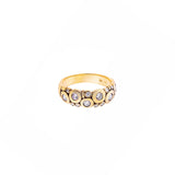 18 Karat yellow gold Candy ring with white round diamonds