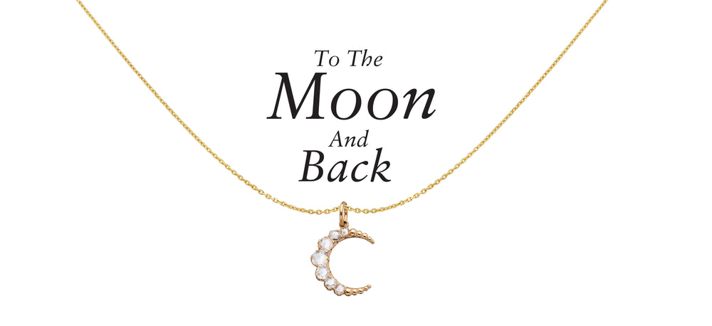 A stunning necklace with to the moon and back inscription, available at an online jewelry store