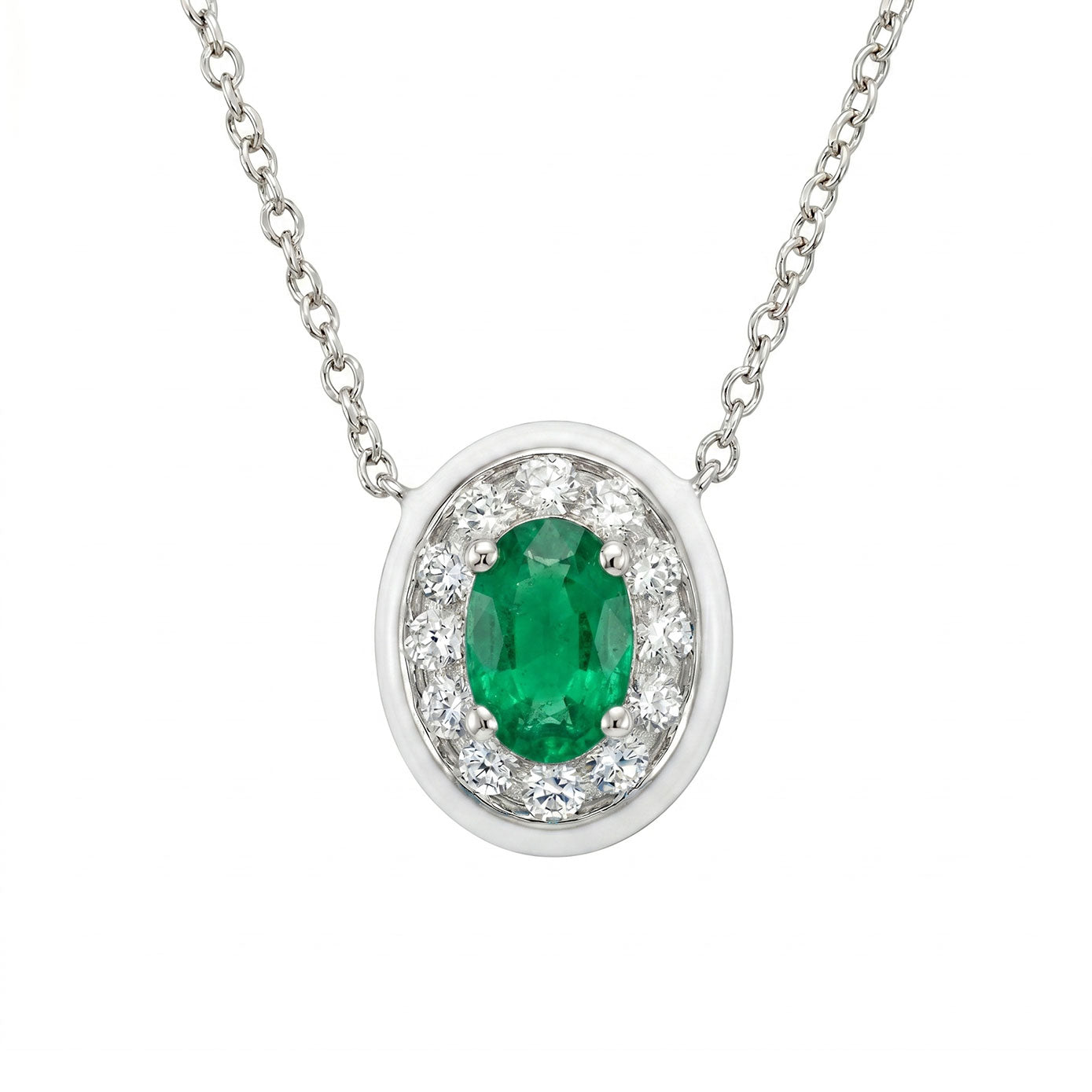 14 Karat White Gold Halo Necklace With An Emerald And Diamonds