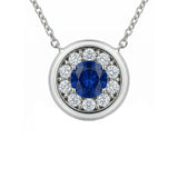 14 Karat White Gold Halo Necklace With A Blue Sapphire And Diamonds