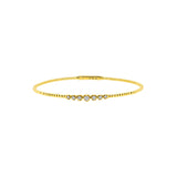 14 Karat Yellow Gold Flexible Bangle with Bezel set Diamonds