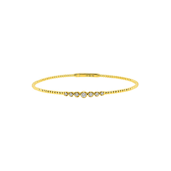 14 Karat Yellow Gold Flexible Bangle with Bezel set Diamonds