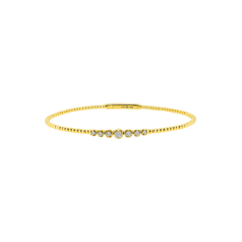 14 Karat Yellow Gold Flexible Bangle with Bezel set Diamonds