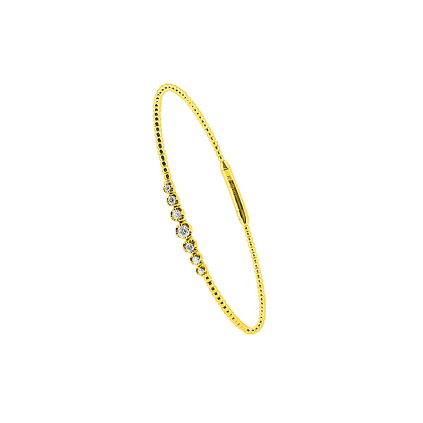 14 Karat Yellow Gold Flexible Bangle with Bezel set Diamonds