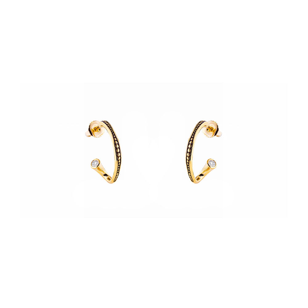 18 karat yellow gold Twist hoop earrings with diamonds