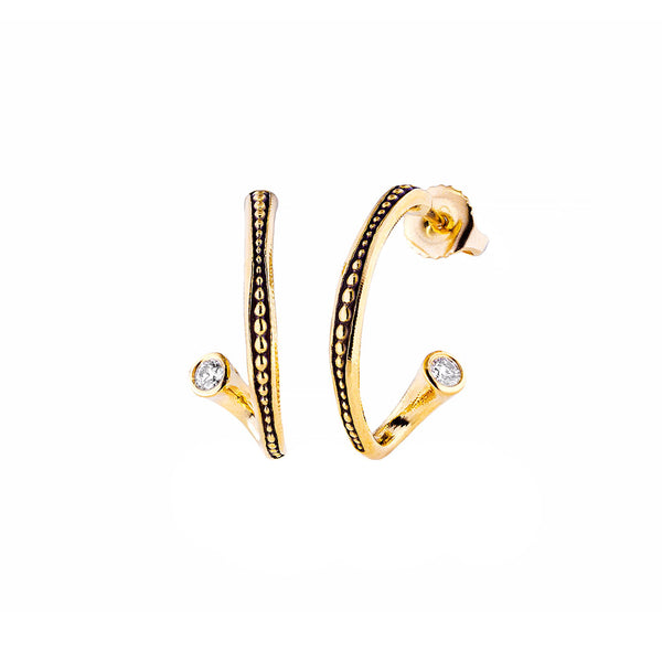 18 karat yellow gold Twist hoop earrings with diamonds