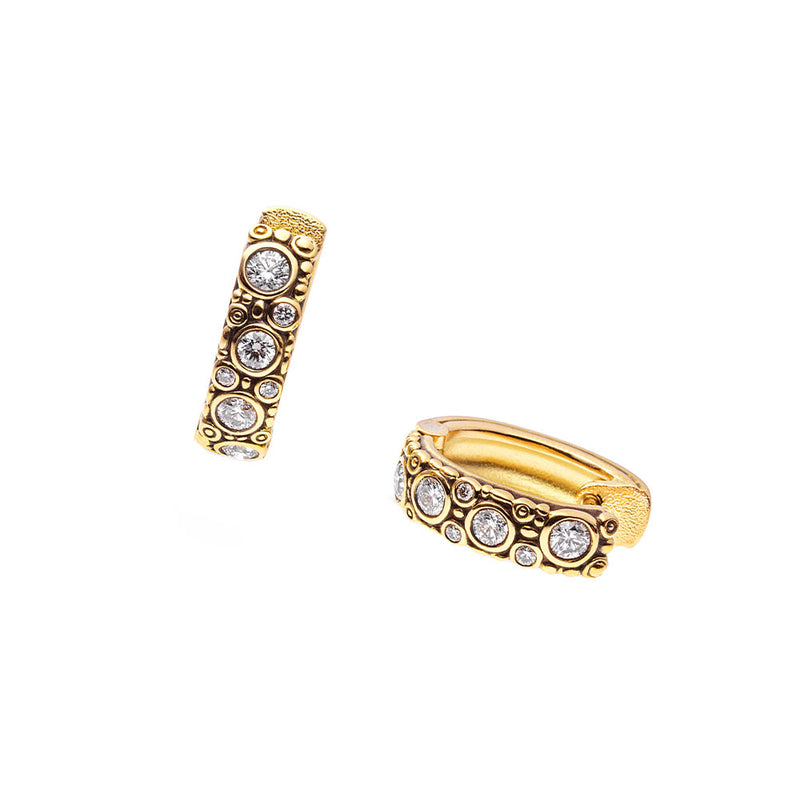 18 karat yellow gold oval hoops with diamonds