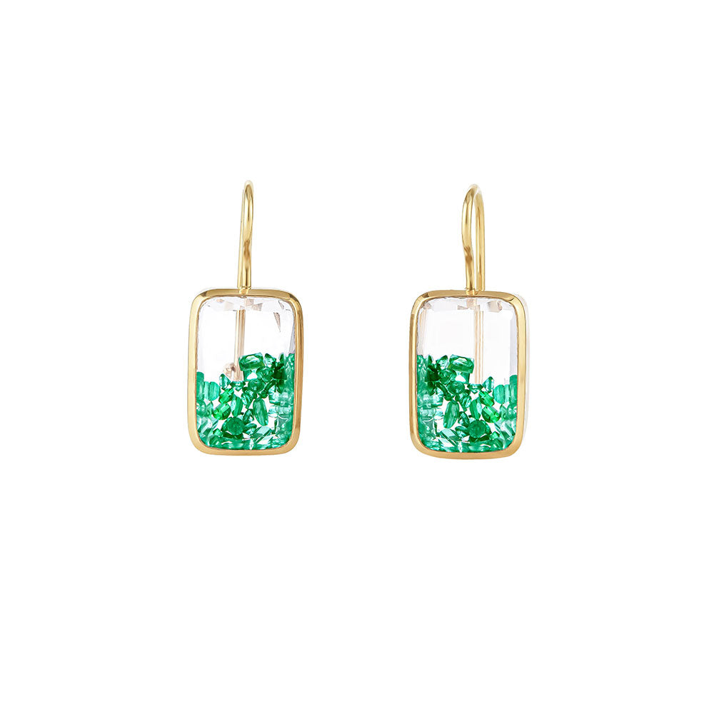 Elegant gold and green glass earrings, embodying the essence of timeless masterpieces