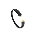 Titanium and 14 Karat Yellow Gold Flexible Cuff Bracelet with Diamonds