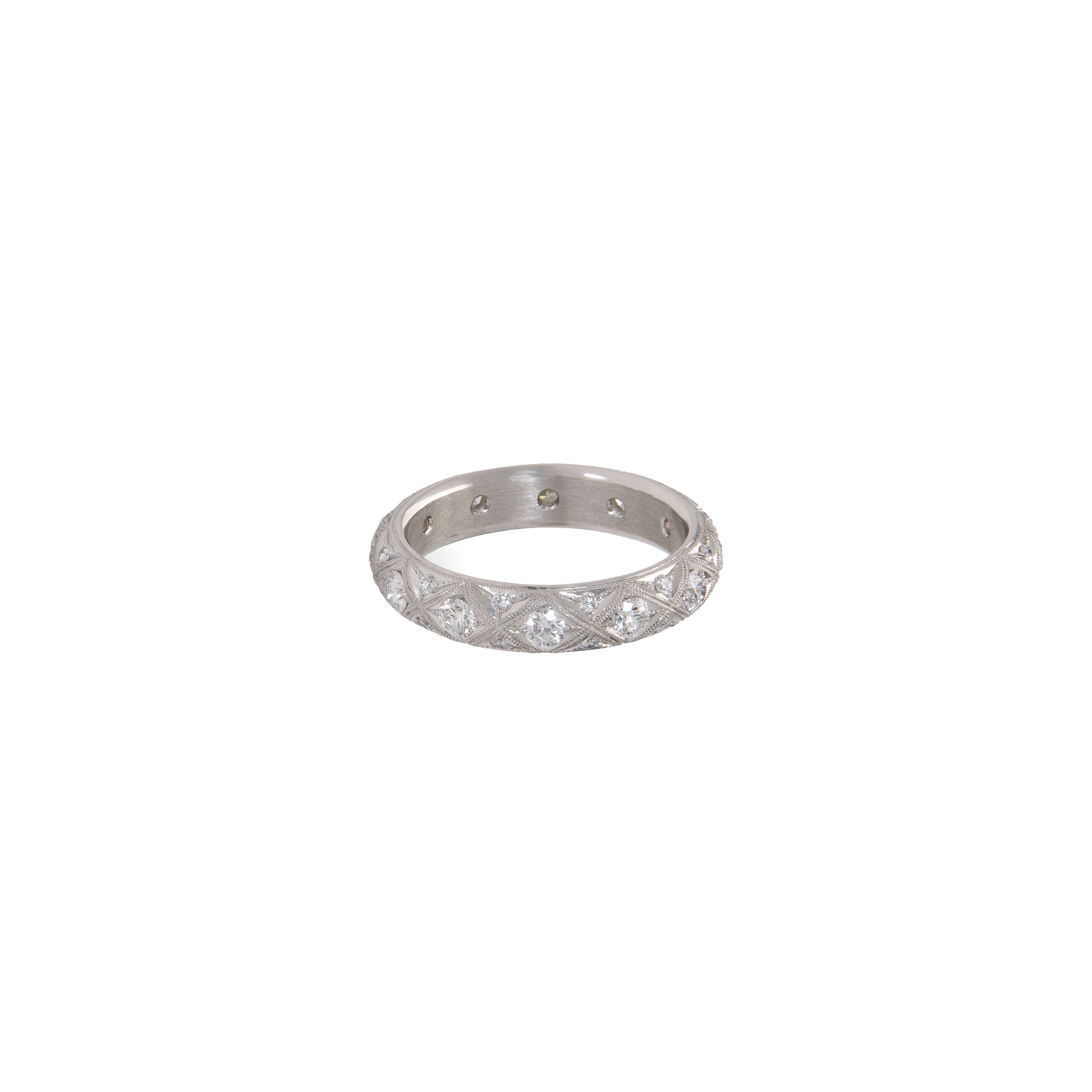 Platinum Serpents Eternity Band with diamonds