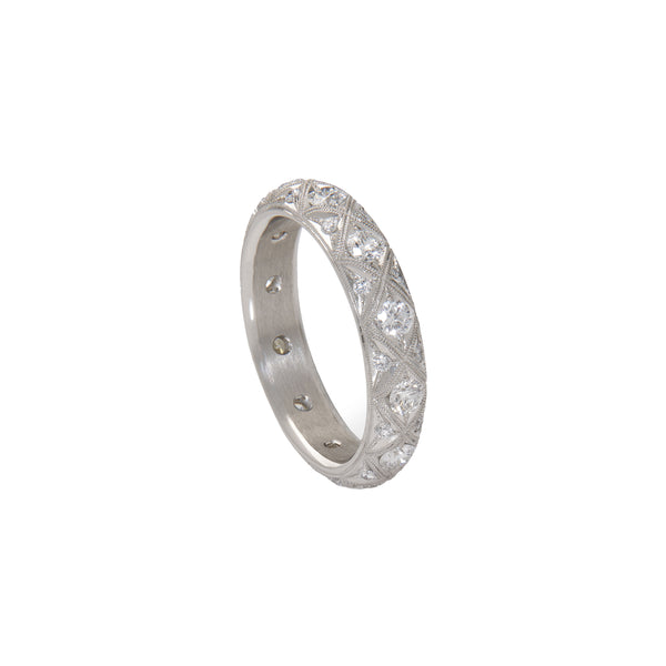 Platinum Serpents Eternity Band with diamonds