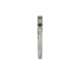 14 karat white gold emerald and diamond bezel set band