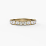 14 karat yellow gold ring with bezel set oval diamonds