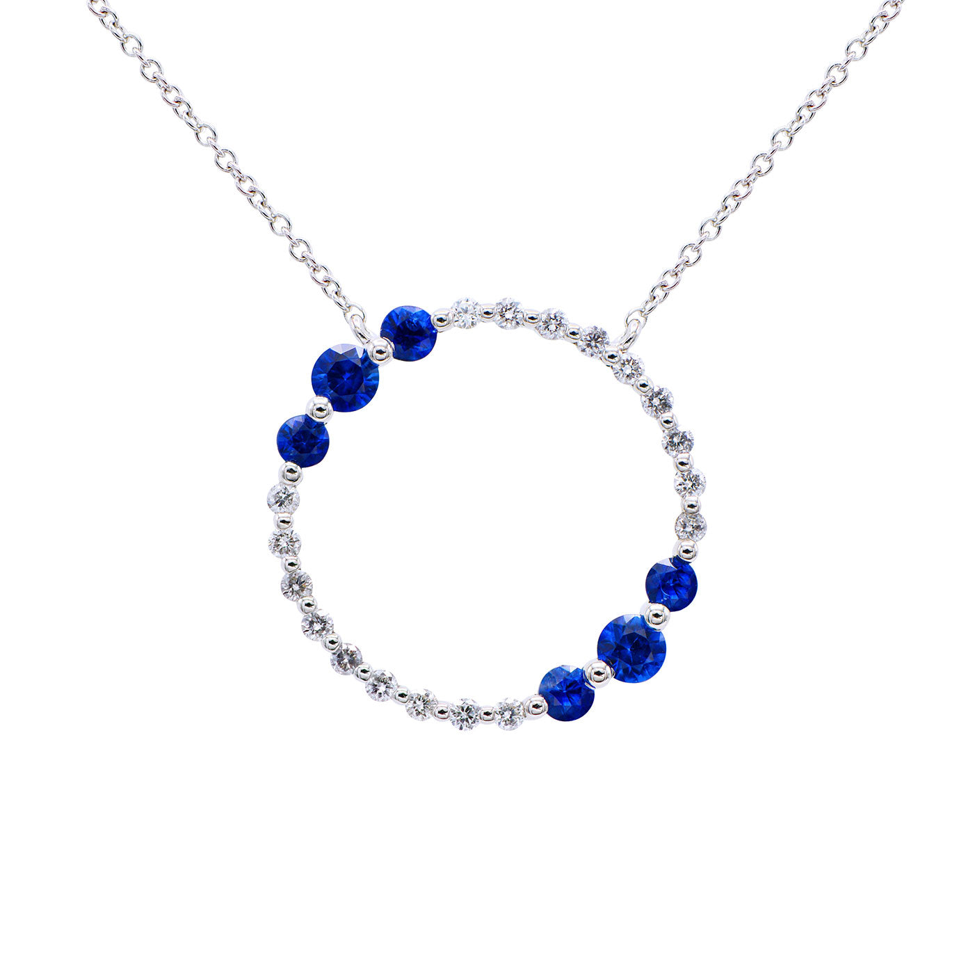 18 Karat White Gold circle necklace With Sapphires and diamonds