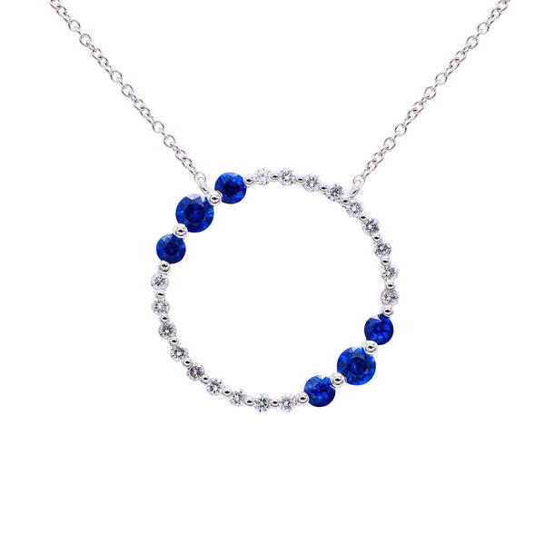 18 Karat White Gold circle necklace With Sapphires and diamonds