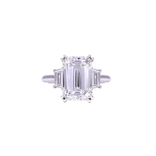 Platinum Three Stone Ring with 5.07 Emerald Cut Diamond