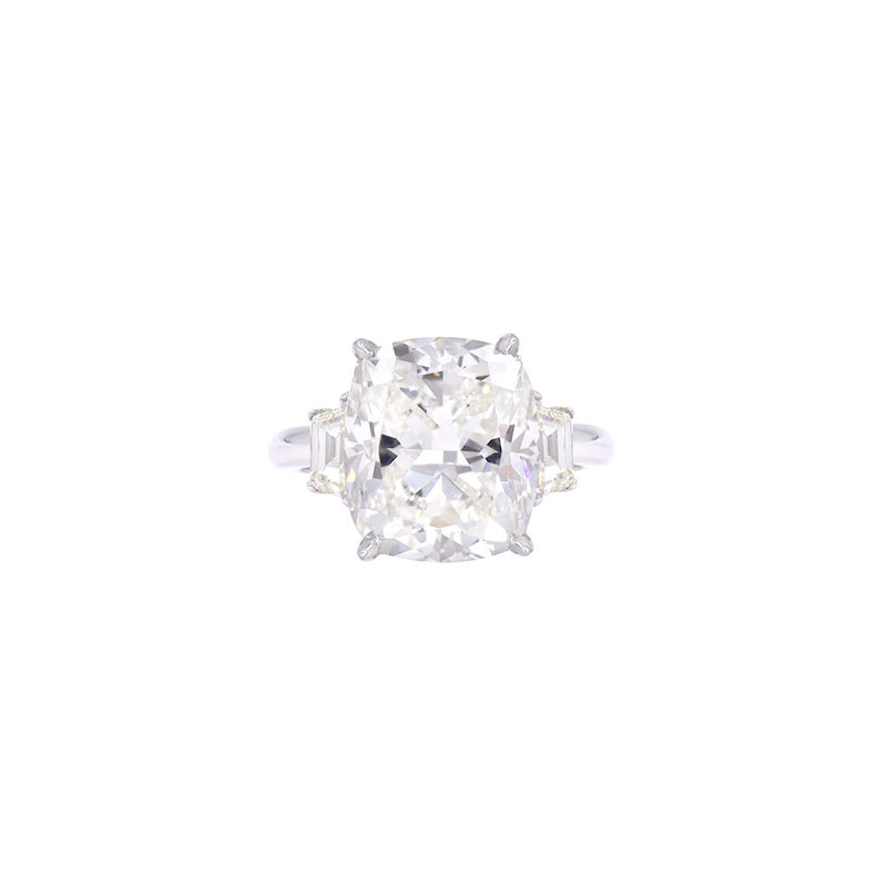 Platinum Three Stone Ring with 6.12 Emerald Cut Diamond