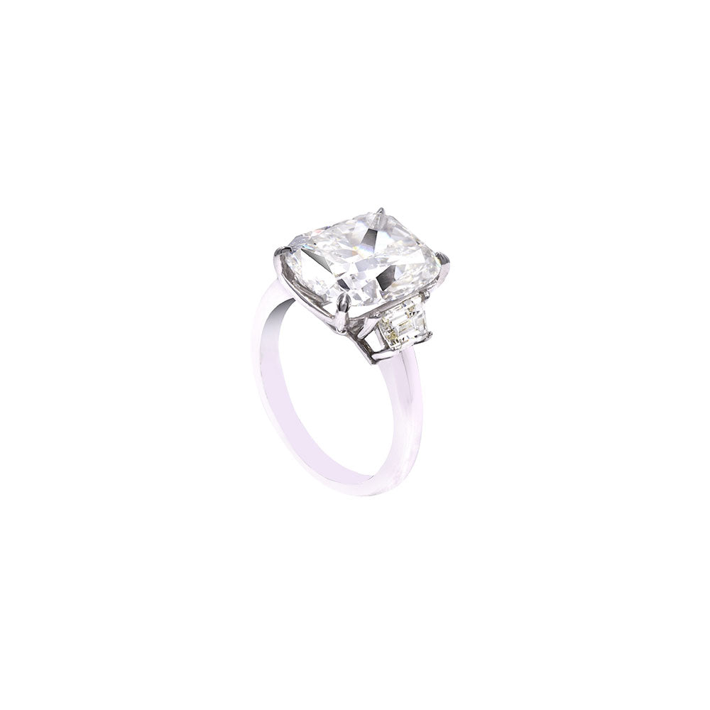 Platinum Three Stone Ring with 6.12 Emerald Cut Diamond