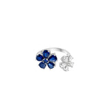18 Karat White Gold open ring with Sapphire and Diamond flowers