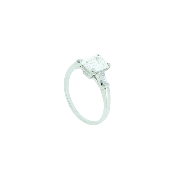 Platinum Three Stone Ring with Emerald Cut Diamond